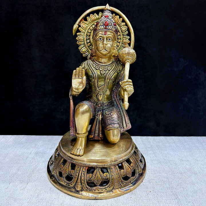  The "10.6 Inch Brass Hanuman Idol – Protector of Courage and Faith" is a stunningly detailed representation of Lord Hanuman, the embodiment of strength, devotion, and unwavering courage. 