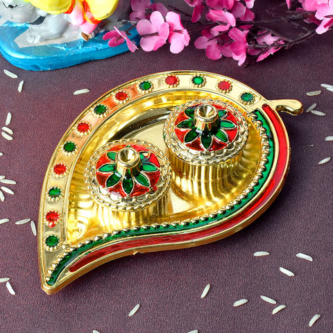 Leaf-inspired kumkum holder crafted with precision, featuring detailed traditional design for ritualistic and decorative use. India’s Largest Pooja Accessories Brand – www.satvikstore.in 