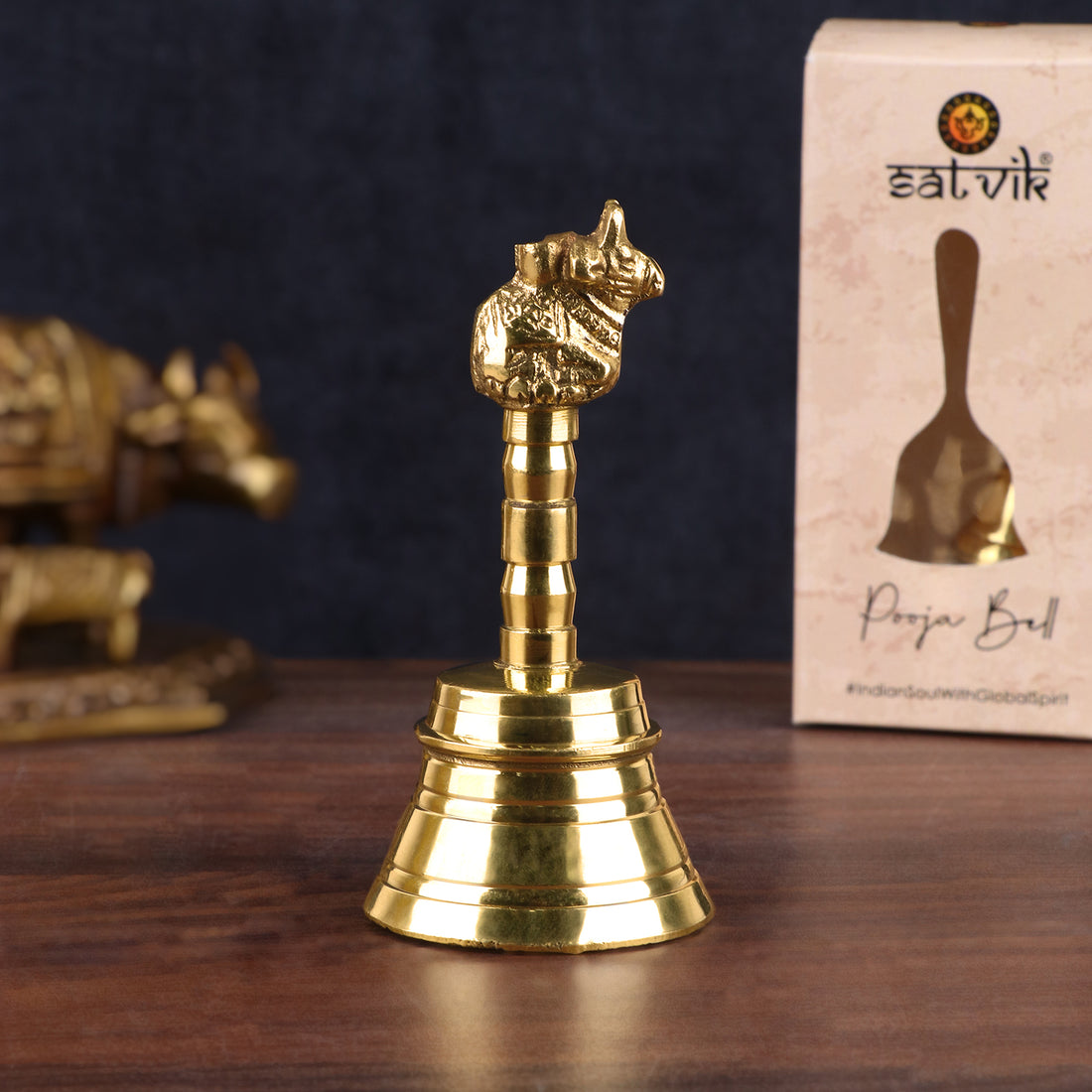 Nandi Brass Puja Bell with detailed carvings of Nandi atop the handle, ideal for temple rituals and daily worship. India’s Largest Pooja Accessories Brand – www.satvikstore.in