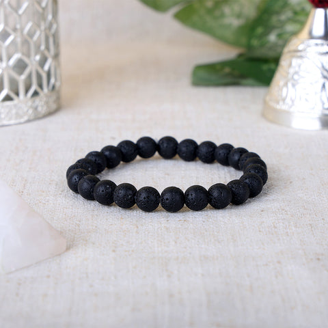 Natural black lava stone healing beaded bracelet with porous 8mm volcanic beads. India’s Largest Pooja Accessories Brand - www.satvikstore.in