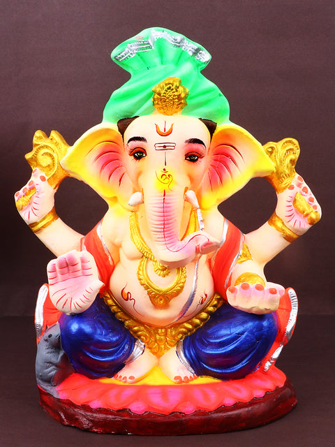 10-inch Omkara eco-friendly Ganesha idol crafted from shadu mati, featuring Lord Ganpati in a serene sitting pose with detailed ornaments and natural colors. India’s Largest Pooja Accessories Brand – www.satvikstore.in