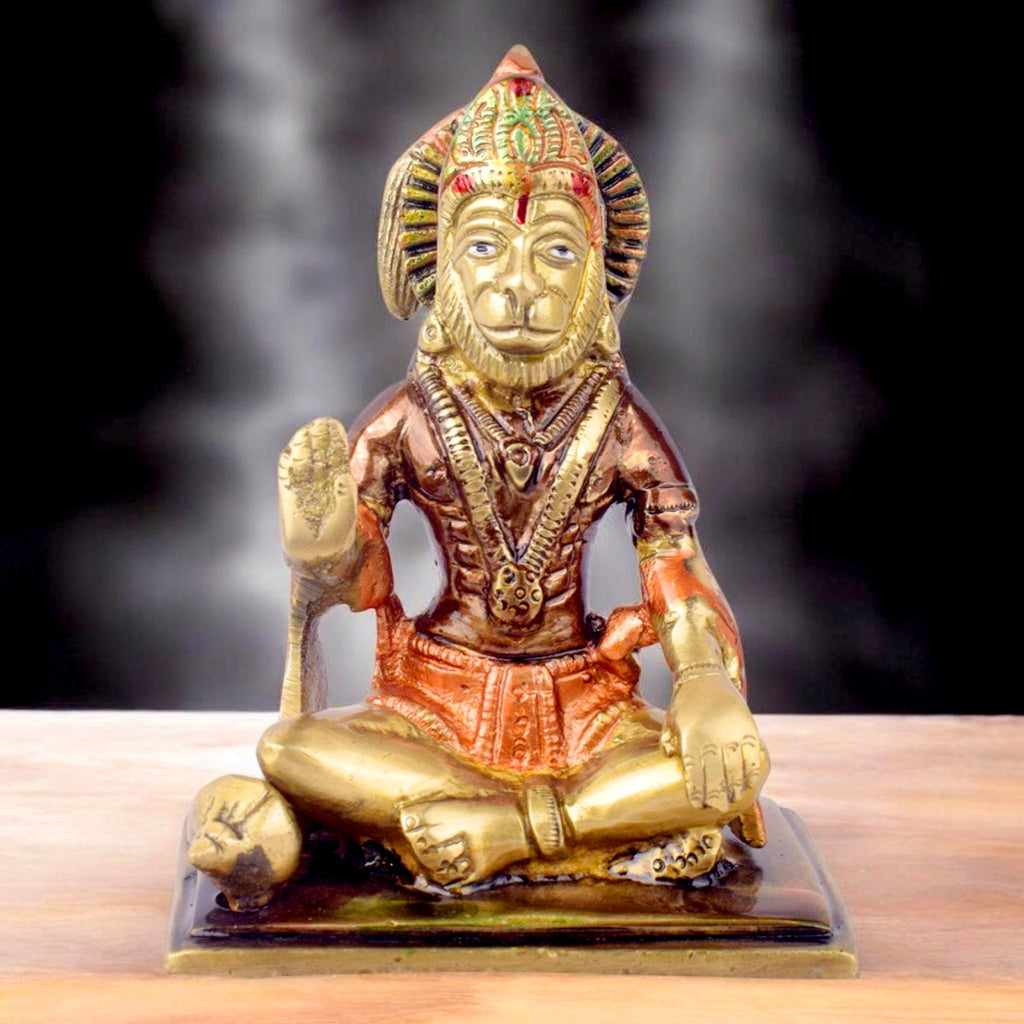 The "4.5 Inch Eternal Brass Hanuman Idol" is a finely crafted representation of Lord Hanuman, embodying strength, devotion, and divine protection. Standing at 4.5 inches tall, this compact yet striking idol is made from high-quality brass, showcasing intricate details that highlight Hanuman’s powerful form and serene expression