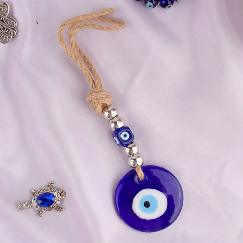 Protective Evil Eye Wall Hanging – brings luck and wards off negativity with its striking design. India’s Largest Pooja Accessories Brand – www.satvikstore.in

