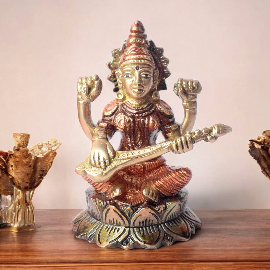 4.7 Inch Spiritual Brass Saraswati Statue depicting the Goddess of wisdom and knowledge, intricately handcrafted for divine energy and perfect for home temple or study space. No.1 Brass Idol Store www.satvikstore.in 