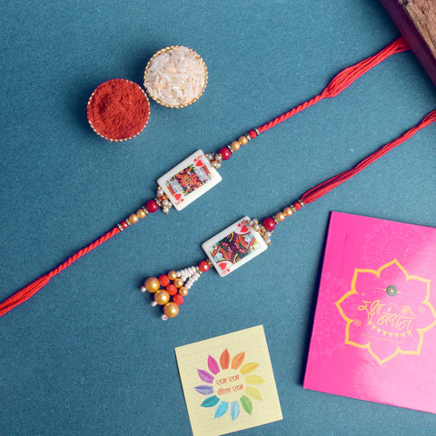 Designer Couple Rakhi Set for Bhaiya and Bhabhi with Roli Chawal and Ram Sita Stickers – Raksha Bandhan Gift Combo. India’s Largest Brass Idols Brand - www.satvikstore.in