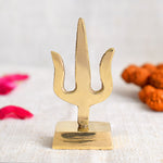 Elegant Trishul dashboard idol designed for cars, symbolizing divine power and protection, featuring fine craftsmanship to enhance spiritual aura and positivity while traveling. India’s Largest Pooja Accessories Brand – www.satvikstore.in 