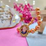 Orange Round Pearl Bracelet with Jai Guruji Swaroop