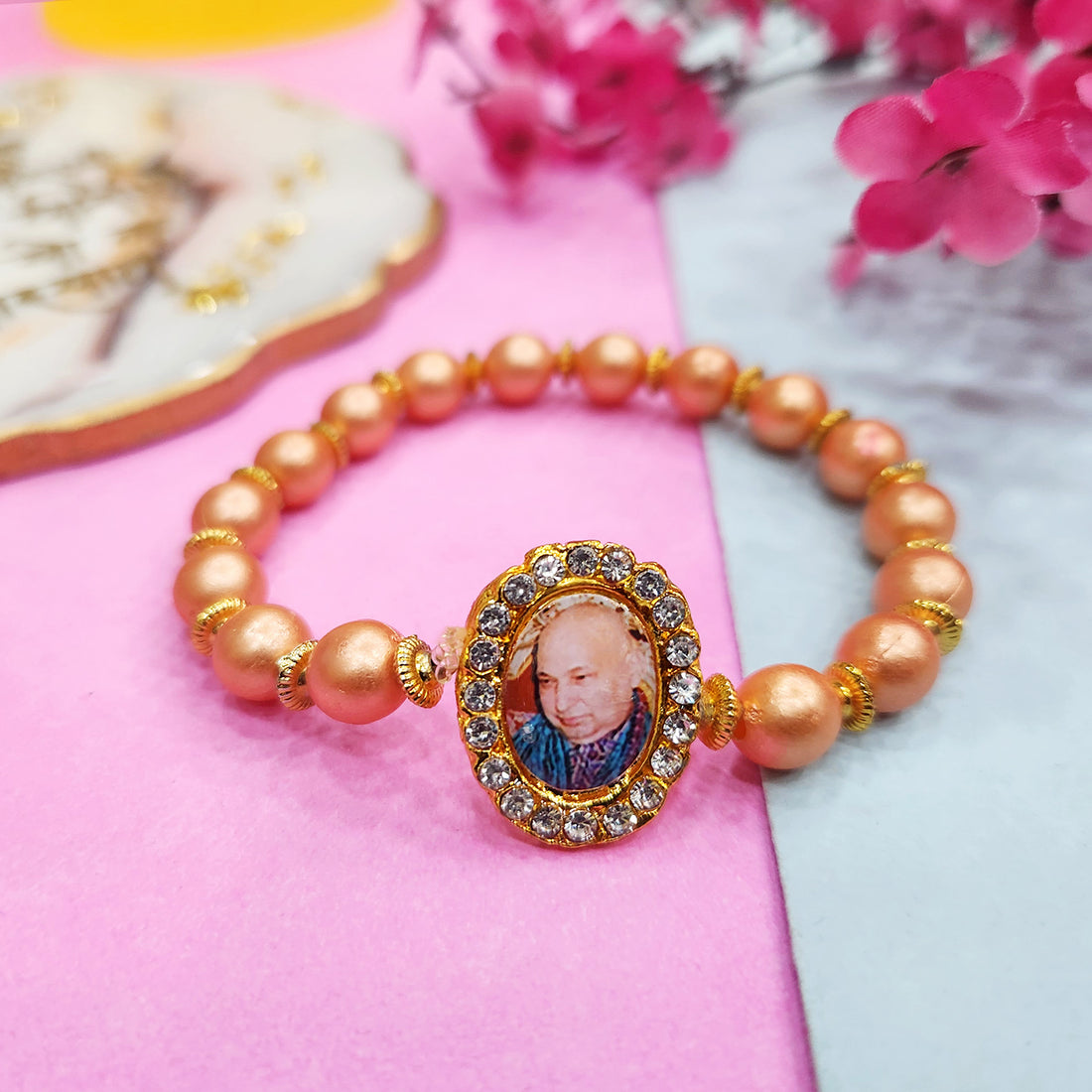 Orange Round Pearl Bracelet with Jai Guruji Swaroop