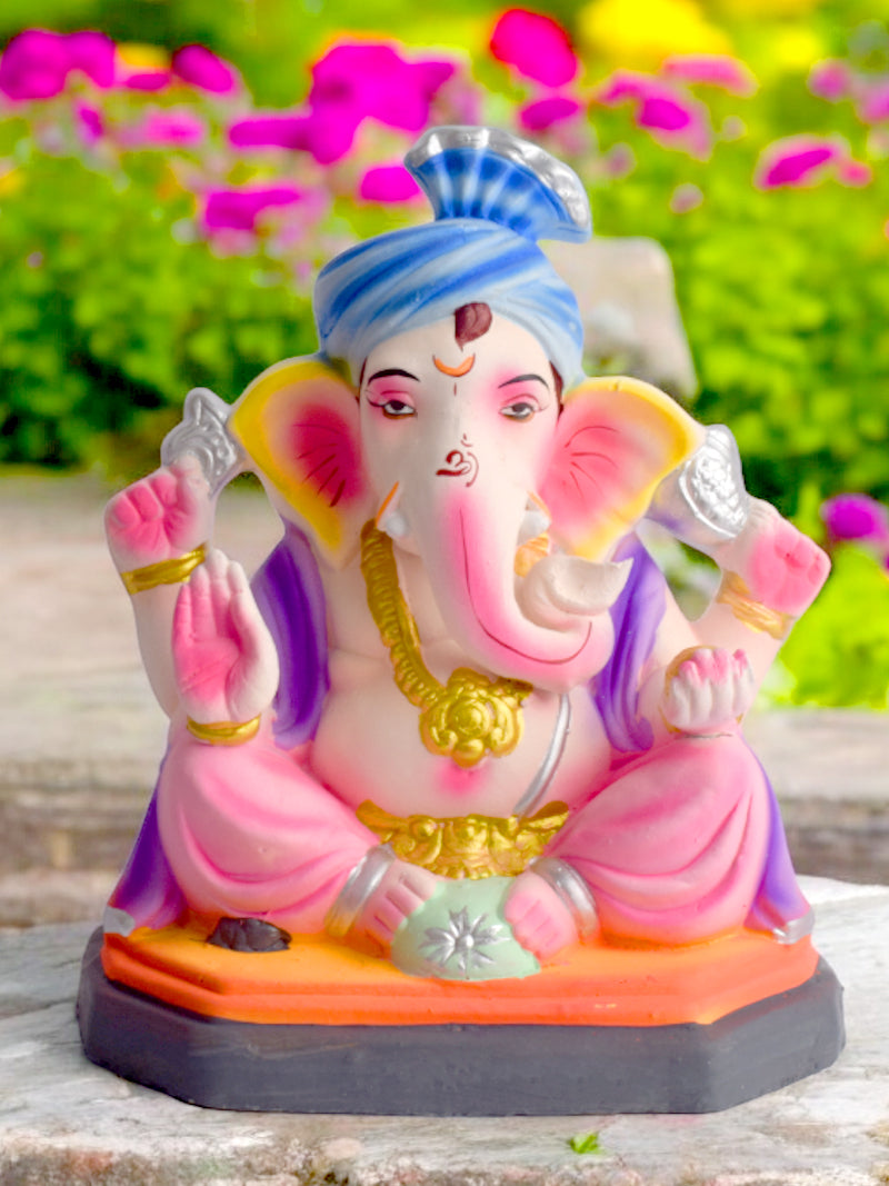 Vibrant 8-inch eco-friendly Ganesha idol in a relaxed sitting pose | India’s Largest Pooja Accessories Brand – www.satvikstore.in