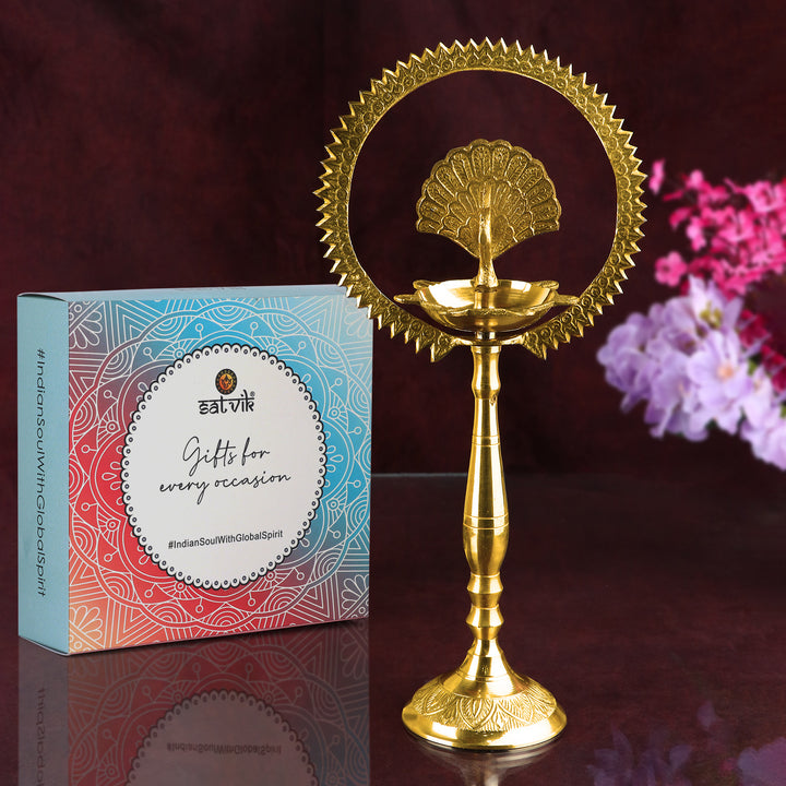 12 Inch Brass Mor Kiran Style Kerala Diya – Handcrafted Kiran style brass peacock diya for traditional rituals and spiritual decor. India’s Largest Pooja Accessories Brand – www.satvikstore.in