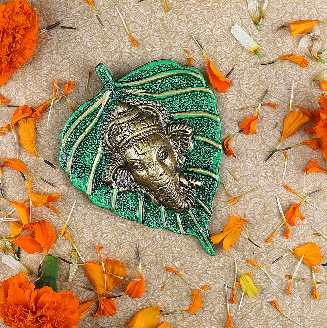 1 Pc Lord Ganesh Face on Leaf Patta Wall Hanging Yellow