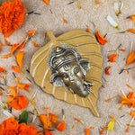 1 Pc Lord Ganesh Face on Leaf Patta Wall Hanging White